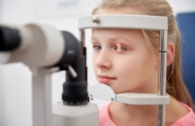 Child receiving depth perception test