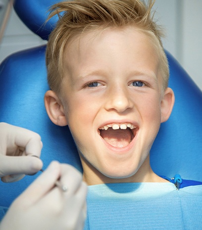 Little boy smiling during children's dentistry visit