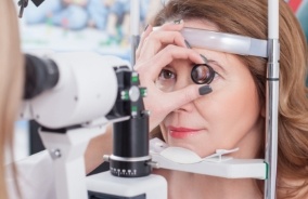 Patient being examined after pupil dilation