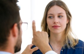 Woman taking eye movement test