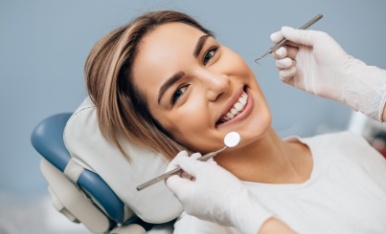 Woman receiving dental checkup