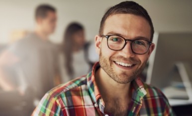 Man smiling after emergency dentistry