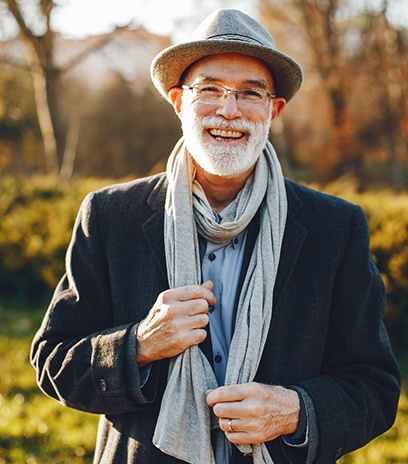 Man smiling with dentures in Belmont