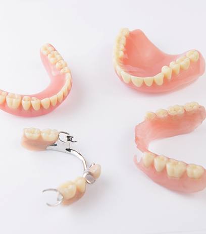 Different types of dentures with white background