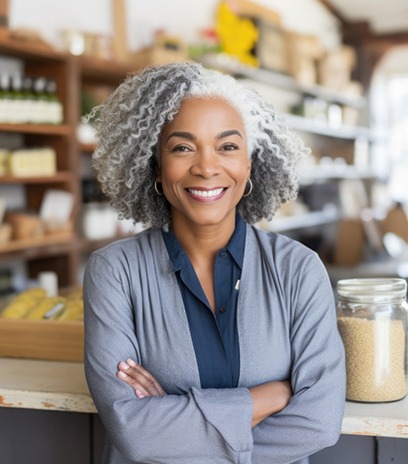 older woman smiling in a store