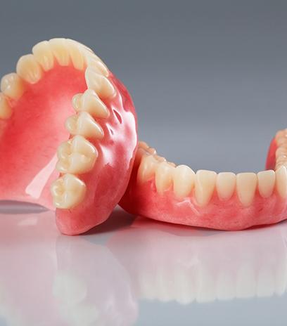 Dentures for upper and lower arch on reflective table