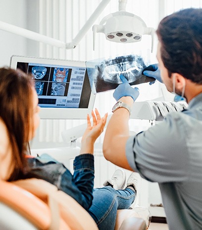 Belmont dentist showing patient X-rays