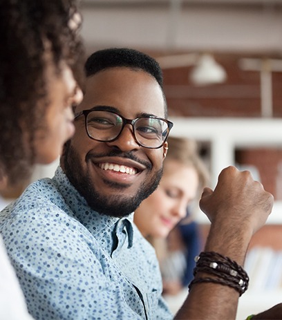 Man wearing glasses to improve myopia