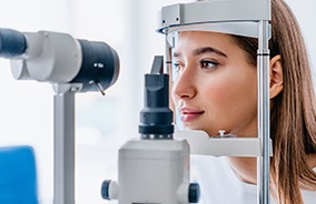 Female patient having her eyes examined 