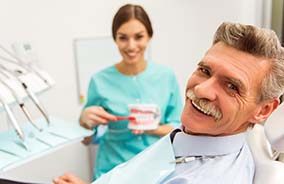 Male dental patient visiting emergency dentist in Belmont, MA