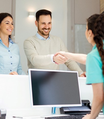 Man meeting receptionist