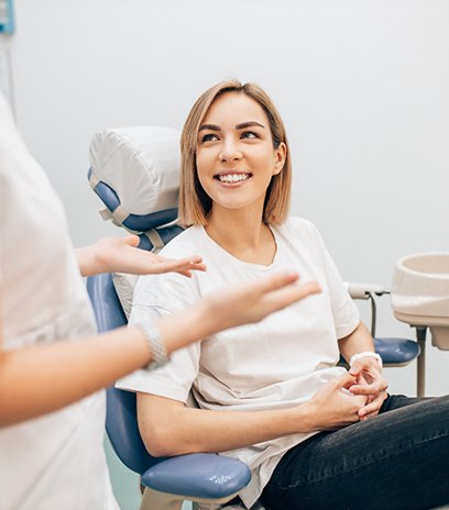 patient talking to dentist 