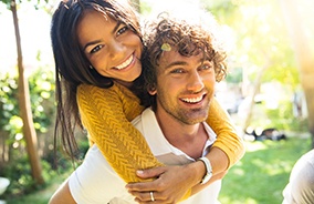 smiling couple with veneers in Belmont