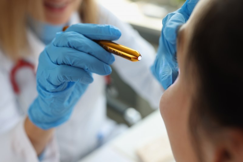 A woman getting care for an eye emergency